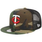 Minnesota Twins New Era Woodland Camo Trucker 9FIFTY Snapback Hat Lifestyle