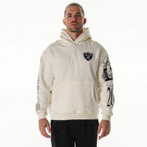 Las Vegas Raiders The Wild Collective Unisex Stacked Graphic Sleeve Fleece Hoodie Cream - NFL