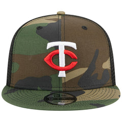 Minnesota Twins New Era Woodland Camo Trucker 9FIFTY Snapback Hat Lifestyle