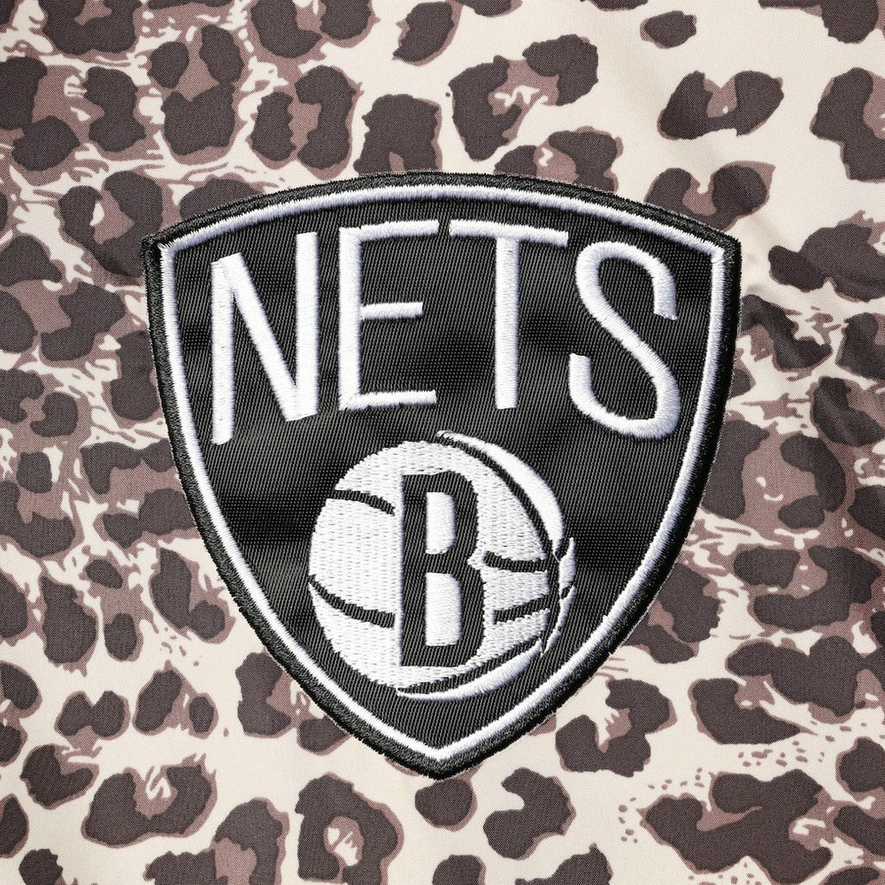 NBA - Brooklyn Nets DKNY Sport Women's Gabriella Windbreaker Half-Zip Hoodie - Leopard