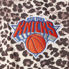 NBA - New York Knicks DKNY Sport Women's Gabriella Windbreaker Half-Zip Hoodie - Leopard